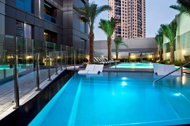 Damac Maison The Vogue Дубай Экстерьер фото The swimming pool at the Address Downtown