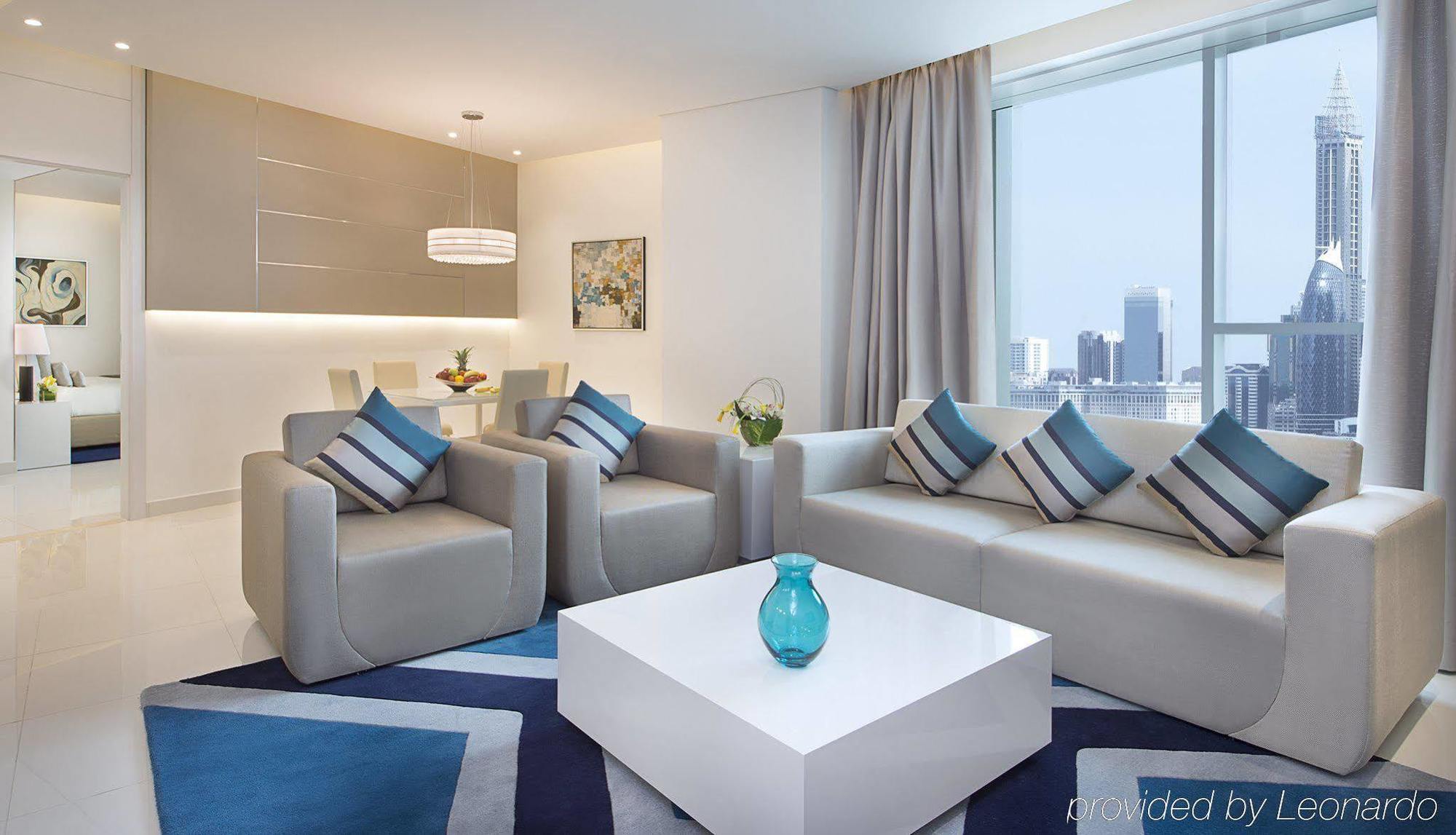Damac Maison The Vogue Дубай Экстерьер фото A living room