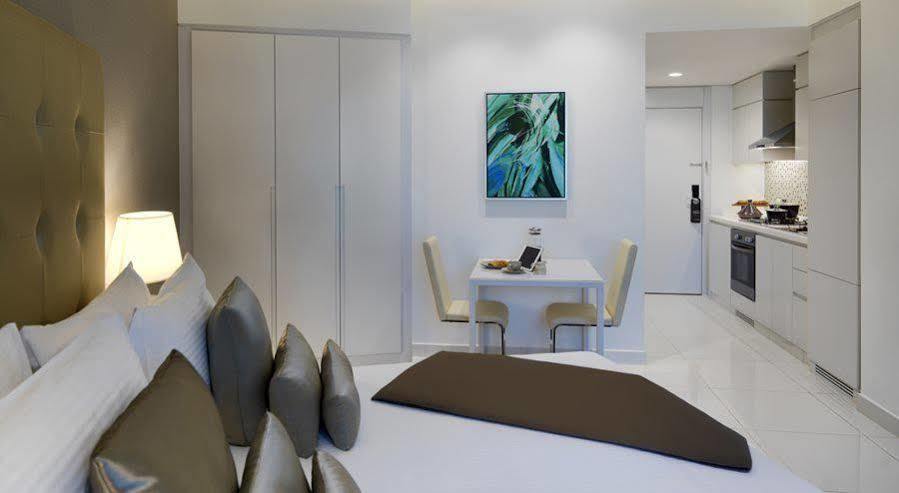 Damac Maison The Vogue Дубай Экстерьер фото A typical apartment interior
