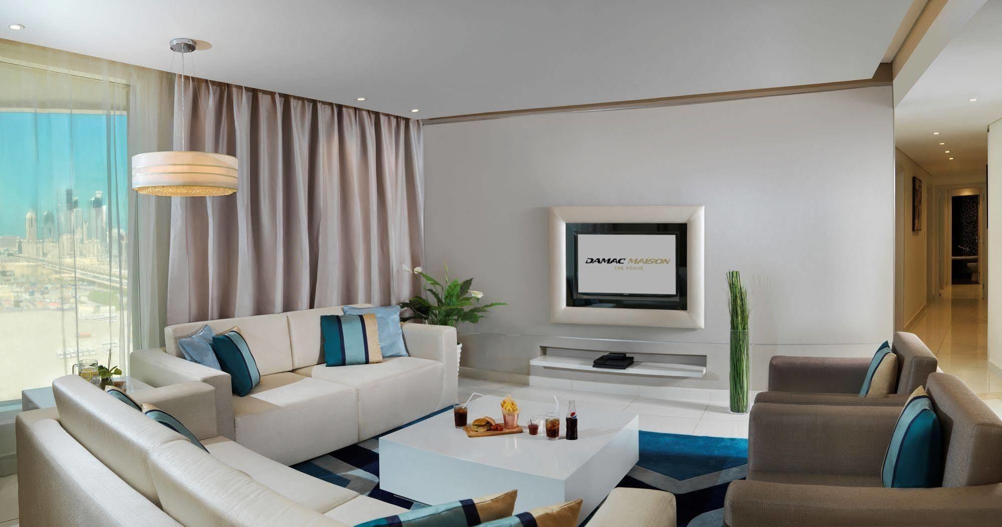 Damac Maison The Vogue Дубай Экстерьер фото A living room