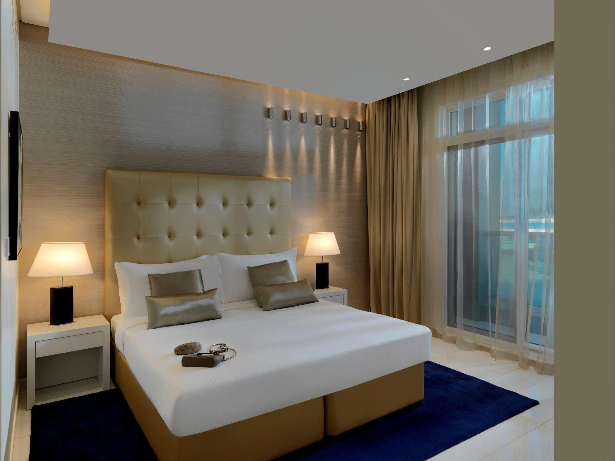 Damac Maison The Vogue Дубай Экстерьер фото A bedroom at the hotel