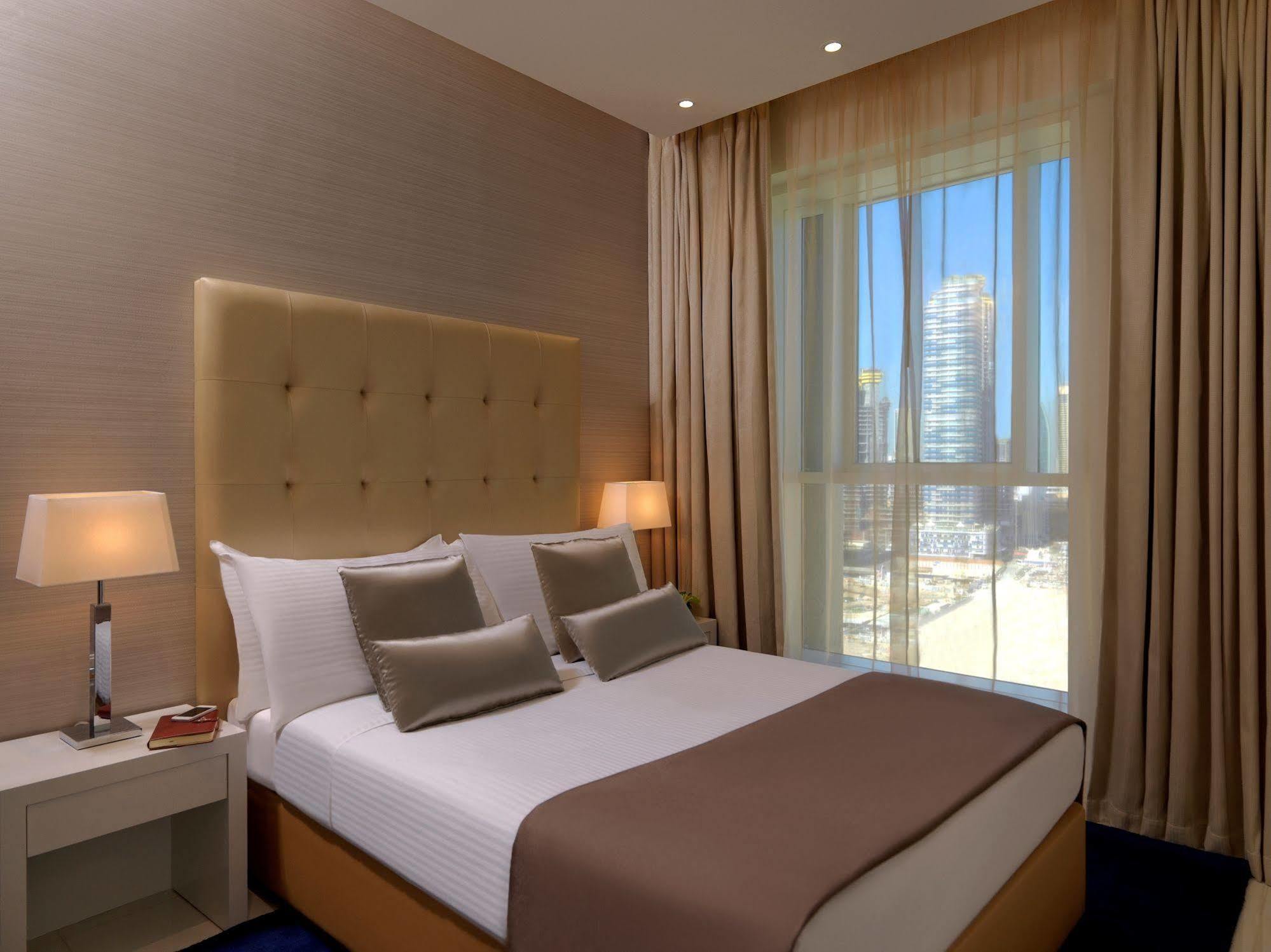 Damac Maison The Vogue Дубай Экстерьер фото A bedroom at the hotel