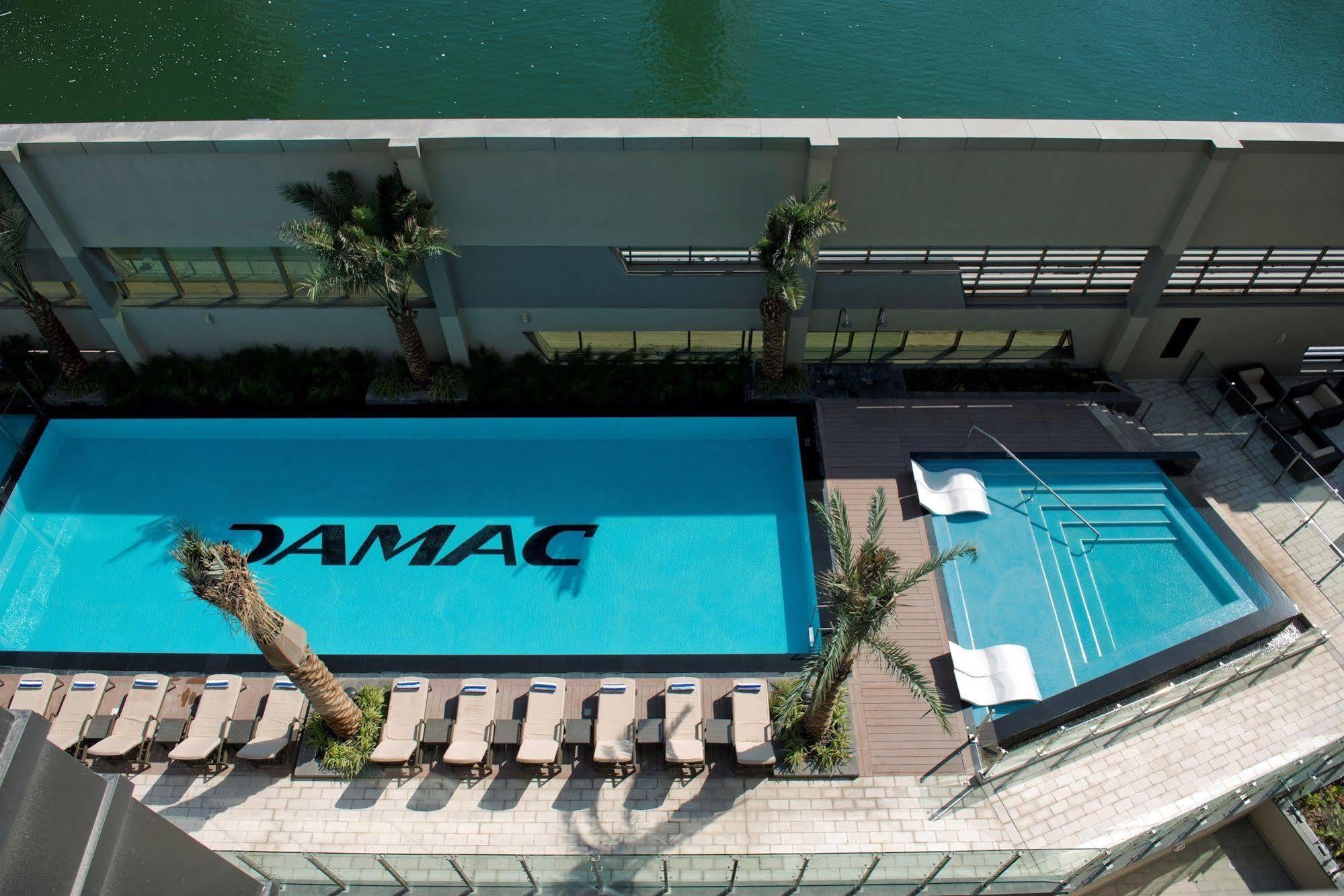 Damac Maison The Vogue Дубай Экстерьер фото The pool at the TAMAC headquarters